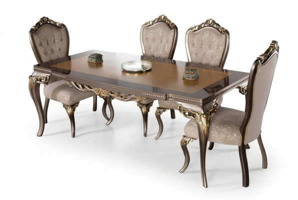 Tavolo da pranzo classico in legno massello con decorazioni elaborate