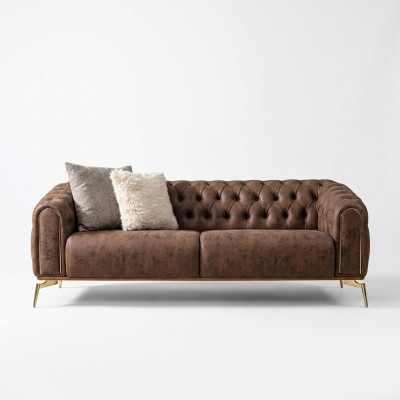 Divano Chesterfield a 4 posti in poliestere marrone e ecopelle.