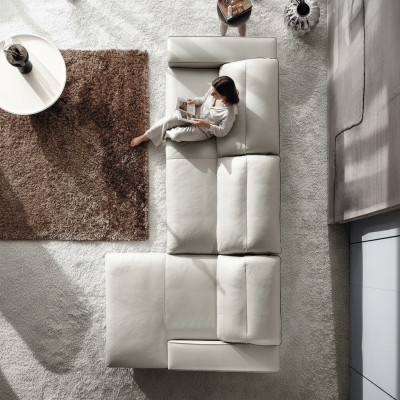 Divano angolare design a forma di L con rivestimento in pelle da soggiorno di lusso.