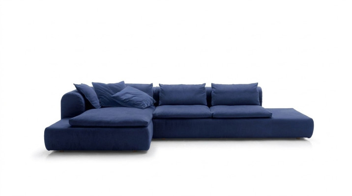 Divano angolare a L blu in tessuto per divani imbottiti.