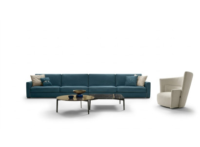Divano a 4 posti in pelle imbottita, design divani italiani blu.
