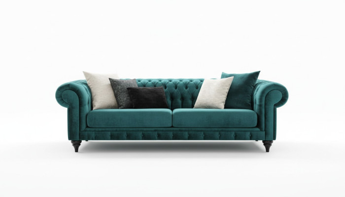 Classico divano Chesterfield a tre posti in verde di lusso, traduzione in italiano: Divano Chesterfield classico a tre posti di lusso verde.