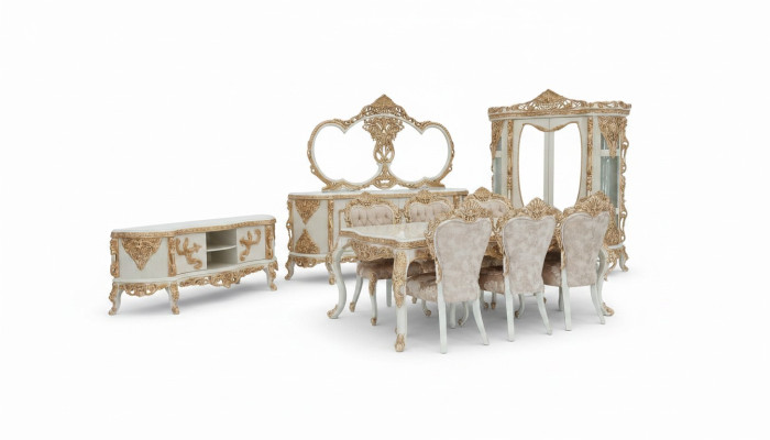 Magnifico set completo di mobili per sala da pranzo con abbondanti elementi decorativi.