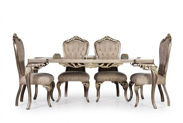 Sedie di lusso Chesterfield marroni, tavolo da pranzo di design, mobili esclusivi per la sala da pranzo.