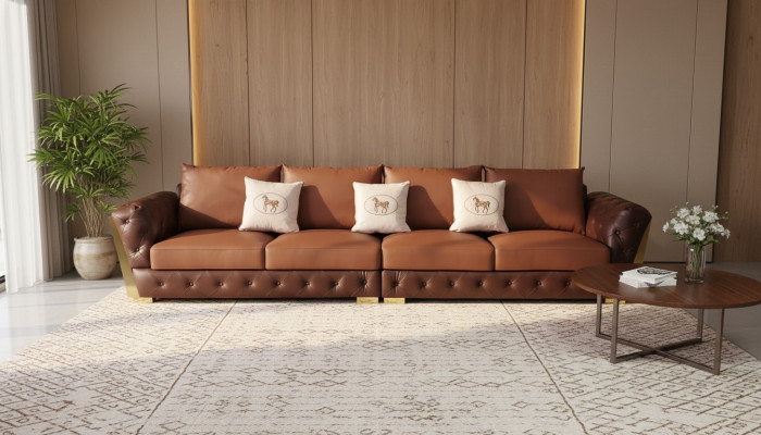 Moderno divano Chesterfield di lusso a cinque posti per il soggiorno di design.