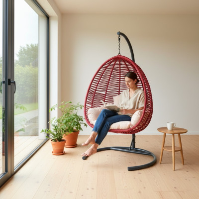 Poltrona ovale in rattan rosso con base in acciaio inossidabile per un confortevole relax. Nuova