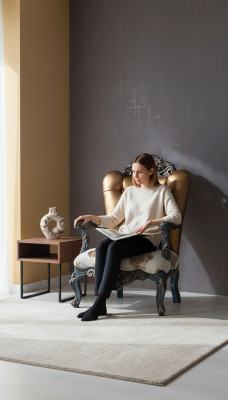 Poltrona di design Chesterfield con schienale dorato per il soggiorno