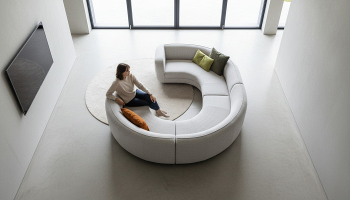 Divano a angolo design a forma di U per soggiorno imbottito.