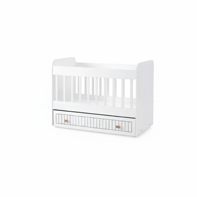 Lettino per bambini con cassettone bianco in stile per la camera dei bambini.