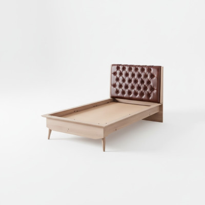Letto loft in legno Chesterfield 100x200 cm. Struttura del letto con testata imbottita.