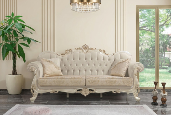 Divano a tre posti in stoffa beige Chesterfield.