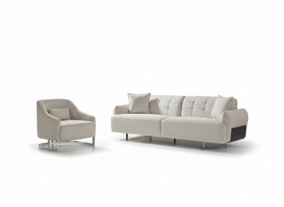 Divano di lusso in bianco completo con tre posti e due poltrone imbottite.