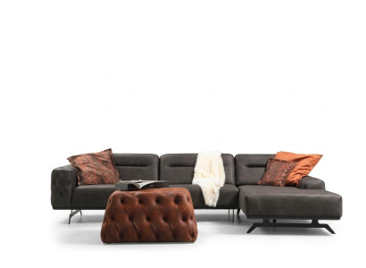 Divano ad angolo a L in tessuto grigio con pouf, divano imbottito a forma di L in tessuto.