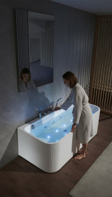 Vasca idromassaggio con getti idromassaggio a led ergonomica per il relax.