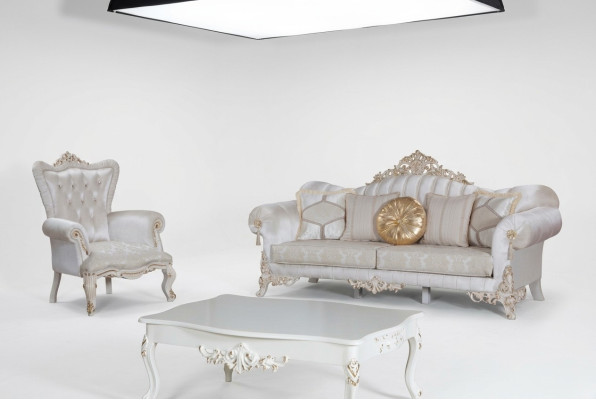 Set di divani di lusso per il soggiorno in stile classico nel colore bianco.