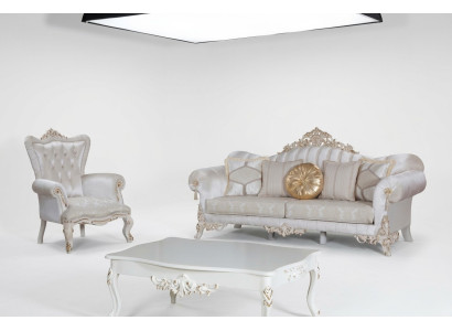 Set di divani di lusso per il soggiorno in stile classico nel colore bianco.