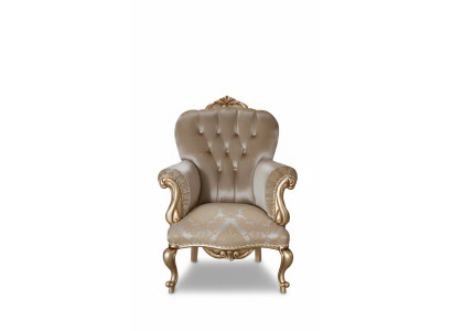 Poltrona classica con decorazione beige e design Chesterfield per il soggiorno.