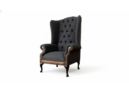 Poltrona Chesterfield grigia in tessuto classico per il soggiorno.