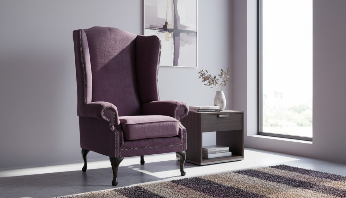 Poltrona Chesterfield in tessuto lounge club trapuntato lilla di lusso con poggiatesta.