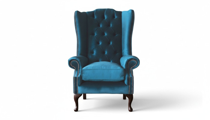 Poltrona grigia con poggiatesta, design Chesterfield in tessuto per il soggiorno.