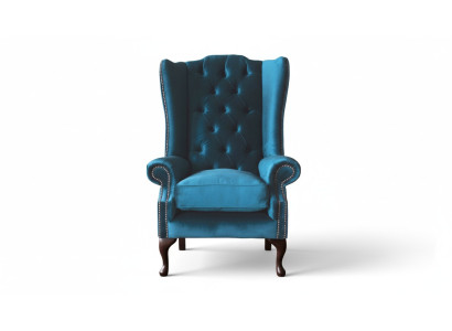 Poltrona grigia con poggiatesta, design Chesterfield in tessuto per il soggiorno.