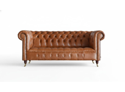 Divano Chesterfield a 3 posti imbottito in pelle marrone.