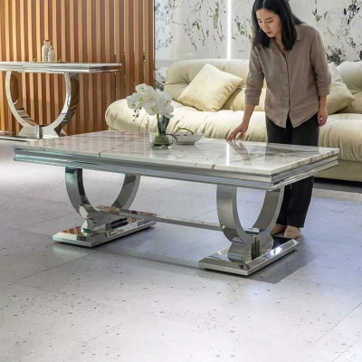 Tavolino moderno grigio in acciaio inossidabile per il soggiorno con design di lusso.