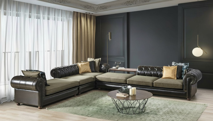 Salotto verde-nero Chesterfield a forma di L nuovo divano imbottito.