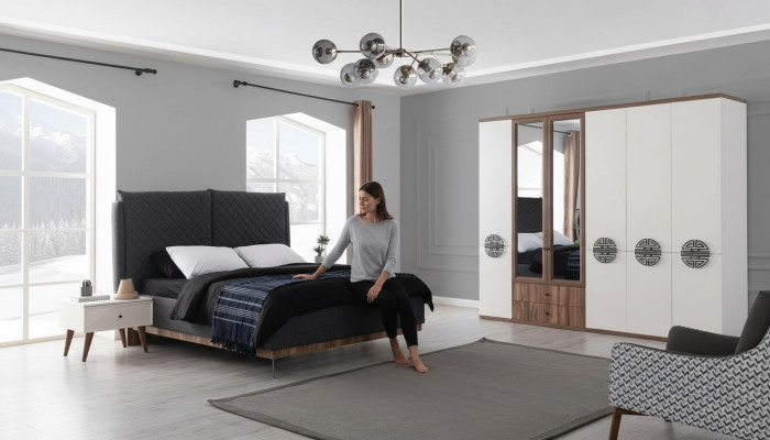 Set da camera da letto moderna, letto matrimoniale di design, armadio, comodini.