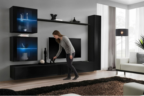 Mobile completo in nero con mobili da designer per il soggiorno, supporto TV moderno.