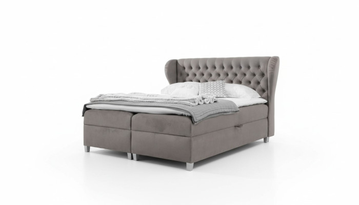 Letto boxspring Chesterfield di lusso, arredamento moderno della camera da letto.