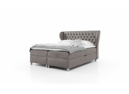 Letto boxspring Chesterfield di lusso, arredamento moderno della camera da letto.