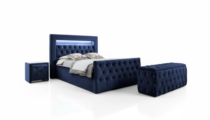 Mobili da camera da letto Chesterfield blu scuro con letto matrimoniale a LED e comodini.