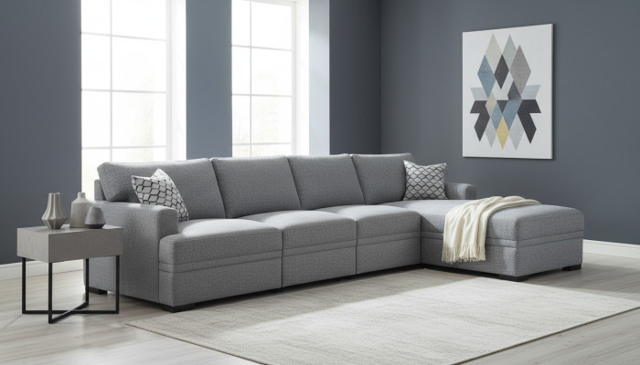 Divano ad angolo a L moderno grigio stile soggiorno divano design arredamento.