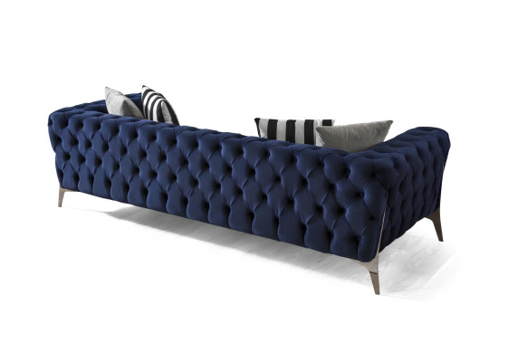 Divano Chesterfield 3 posti in velluto blu lussuoso per il soggiorno.