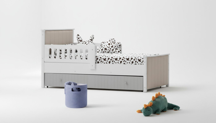 Pratico lettino per bambini di colore grigio per dolci ore di sonno di lusso.