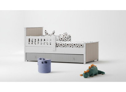 Pratico lettino per bambini di colore grigio per dolci ore di sonno di lusso.