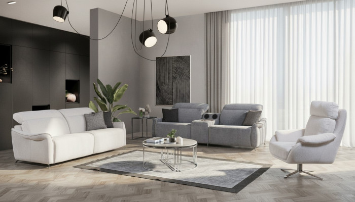 Set di lussuoso soggiorno con 2 divani a 3 posti con sistema audio e poltrona.