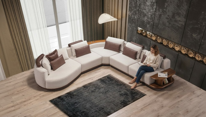 Divano ad angolo bianco per soggiorno di design, a forma di L, imbottito, con struttura in legno.