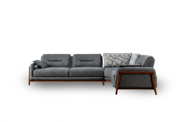 Divano angolare design a L in tessuto di lusso per arredamento da soggiorno.
