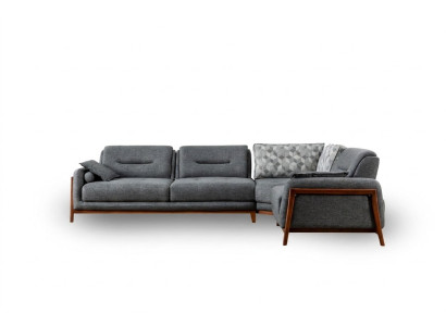 Divano angolare design a L in tessuto di lusso per arredamento da soggiorno.