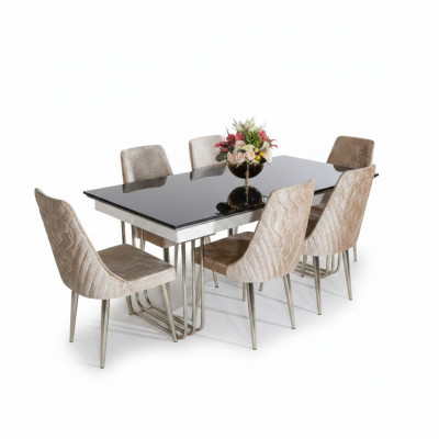 Tavolo da pranzo in vetro bianco e nero con sedie in tessuto da designer per la sala da pranzo.