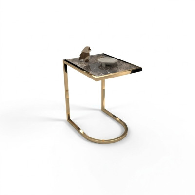 Tavolino da salotto di design di lusso in acciaio inossidabile con piano in vetro.
