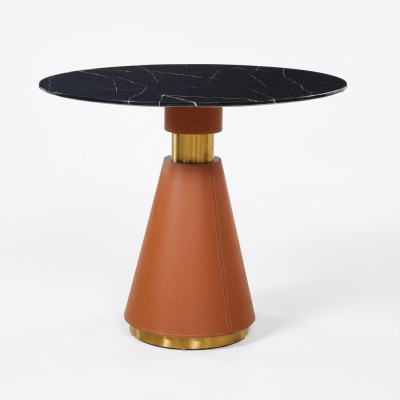 Tavolo rotondo in acciaio nero di stile moderno e lusso.