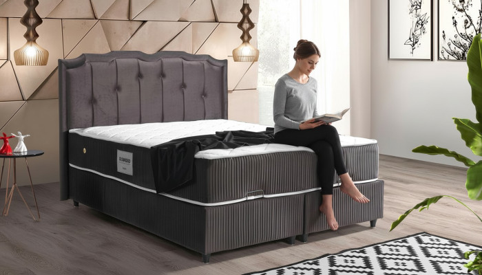 Design Letti di lusso in materiale marrone 160x200 con imbottitura per la camera da letto.