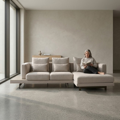Divano angolare moderno grigio designer per il soggiorno.