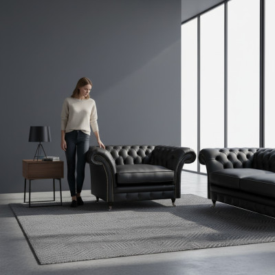 Moderno divano Chesterfield in tessuto per il soggiorno con sedili imbottiti.