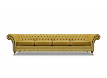 Soggiorno giallo divano quattro posti Chesterfield imbottitura arredo