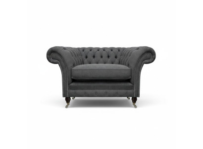 Sedia Chesterfield in tessuto di lusso per il soggiorno.