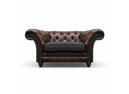 Chesterfield poltrona marrone-grigio in camera da letto moderna a un posto, mobili eleganti.